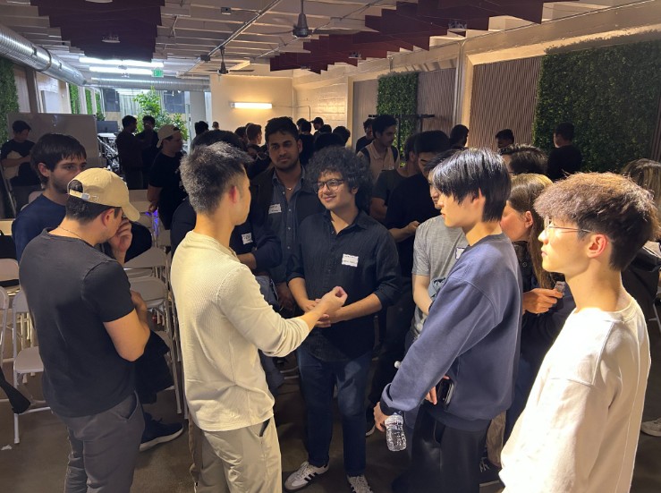 Attendees talking after the session